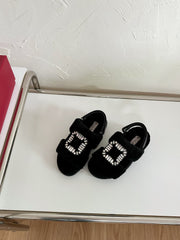 SLIDY VIV' WINTER FUR STRASS BUCKLE SANDALS IN BLACK SHEARLING