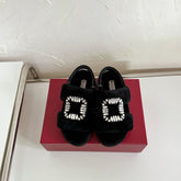 SLIDY VIV' WINTER FUR STRASS BUCKLE SANDALS IN BLACK SHEARLING