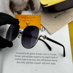 SIGNATURE ROUND SUNGLASSES L8638 IN METAL