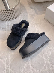 CELINE 25S DANA WEDGE MULE 70MM IN BLACK SUEDE CALFSKIN AND SHEARLING