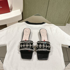 TRUMPET METALLIC MULES IN BLACK PATENT CALFSKIN WITH EMBELLISHED BUCKLE