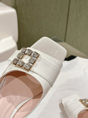CRYSTAL HEEL MULE IN WHITE SHINY CALFSKIN WITH EMBELLISHED BUCKLE