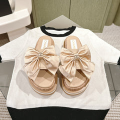 CC SLIPPERS WITH SILK BOW IN BEIGE ALMOND COWHIDE