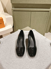 SWING HIGH PUMP 55 MM IN BLACK PATENT CALFSKIN