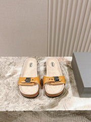 BALENCIAGA 25S SCHOLL SLIDES IN DARK ORANGE PU LEATHER WITH SILVER HARDWARE