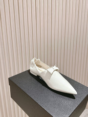 CC FLATS 25S IN WHITE PATENT LEATHER