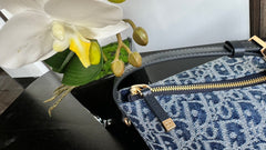 TRAVEL NOMAD POUCH 22 IN BLUE MONOGRAM OBLIQUE JACQUARD