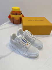 LV TRAINER MAXI SNEAKER IN WHITE EMBOSSED CALFSKIN