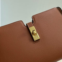 16 STRAP POCHETTE 18 IN BRONZE ORANGE SUPPLE CALFSKIN GOLD HARDWARE