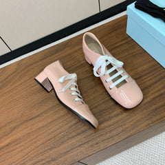 LACE-UP HIGH SHOES IN PALE PINK GLOSSY CALFSKIN