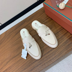 LP FLAT MULES 25S IN CREAM WHITE LAMBSKIN WITH SILVER HARDWARE