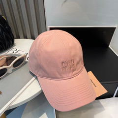 MM BASEBALL CAP IN PEACHY PINK FABRIC BRAND EMBROIDERY