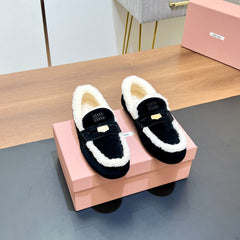 LOAFERS IN BLACK SUEDE AND WHITE SHEARLING TRIM