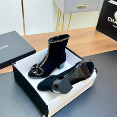 CHANEL 25S HEELED CHAIN BOOTS WITH BOW IN BLACK VELVET GOLD HARDWRE