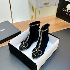CHANEL 25S HEELED CHAIN BOOTS WITH BOW IN BLACK VELVET GOLD HARDWRE