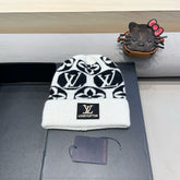 KNITTED BEANIE HAT IN WHITE MIX BLACK WOOL AND RABBIT FUR 426243