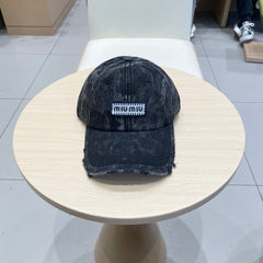 MM DISTRESSED FABRIC BASEBALL CAP IN BLACK WITH EMBROIDERED LOGO