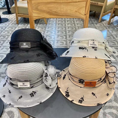 STRAW HAT WITH CHIFFON FLOWER BLACK 672760