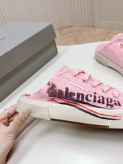 SNEAKER MULES IN PINK CANVAS GRAFFITI LOGO