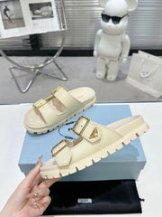 PRADA 25S STRAP SLIDES 30MM IN CREAM CALFSKIN GOLD HARDWARE