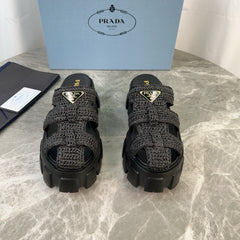 PRADA 25S MONOLITH RUBBER MULES IN BLACK RAFFIA AND LAMBSKIN