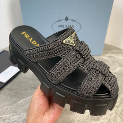 PRADA 25S MONOLITH RUBBER MULES IN BLACK RAFFIA AND LAMBSKIN