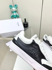 SNEAKER WITH TRIOMPHE IN BLACK AND WHITE CALFSKIN