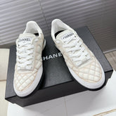 CHANEL 25S TRAINERS WHITE AND LIGHT CORAL IN CALFSKIN
