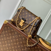 TRUNKIE 27 IN BROWN COATED CANVAS BLACK CALFSKIN SIGNATURE S-LOCK