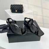 SL CASSANDRA ONE SANDAL FLAT BLACK CALFSKIN