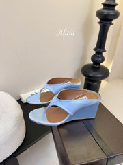 ALAIA WEDGE THONG SANDALS 25S IN BLUE SATIN