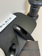 ALAIA HIGH MULES 25S IN BLACK SATIN