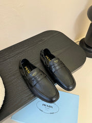PRADA 25S SHUFFLE LOAFERS IN BLACK CALFSKIN