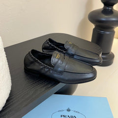 PRADA 25S SHUFFLE LOAFERS IN BLACK CALFSKIN