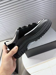 CHANEL 25S SNEAKERS 35MM IN BLACK AND WHITE CALFSKIN