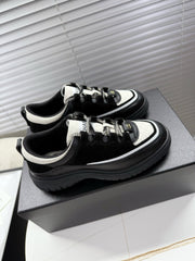 CHANEL 25S SNEAKERS 35MM IN BLACK AND WHITE CALFSKIN