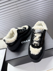 CHANEL 25S SNEAKERS WITH FUR ACCENTS 35MM IN BLACK CALFSKIN