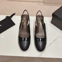 SLINGBACKS IN BLACK SHEEPSKIN