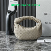 BOTTEGA VENETA 25S MINI JODIE 28 IN MUTED TAUPE SUEDE GOLD HARDWARE