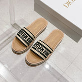 DWAY WEDGE SLIDES 45MM IN BEIGE AND BLACK FABRIC RAFFIA SOLE