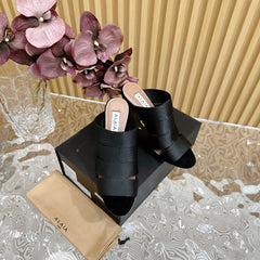 ALAIA ELASTIC CAGE MULE SANDALS IN BLACK WOVEN STRAP AND LAMBSKIN