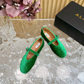 ALAIA BALLET FLATS IN EMERALD GREEN VELVET
