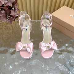 HIGH BOW PLATFORM IN LIGHT PINK SILK