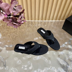 ALAIA PLATFORM THONG SANDALS 25S IN BLACK RAFFIA AND CALFSKIN