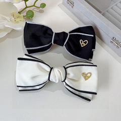 BOW HAIRPIN IN BLACK AND WHITE TRIM COTTON 406022