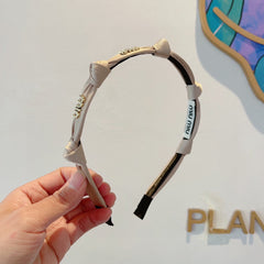 HEADBAND GOLD LOGO IN BEIGE SILK 417302