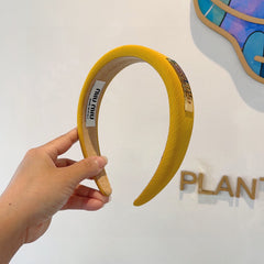 THICK HEADBAND IN YELLOW DIAGONAL LEATHER 425478