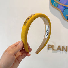 THICK HEADBAND IN YELLOW DIAGONAL LEATHER 425478