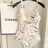 CC BIKINI SWIMSUIT SET IN CREAMY WHITE MIXED WITH CURVED BLACK DETAIL 608919