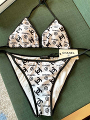 BIKINI SWIMSUIT IN WHITE AND BLACK LOGO PRINTED 627826